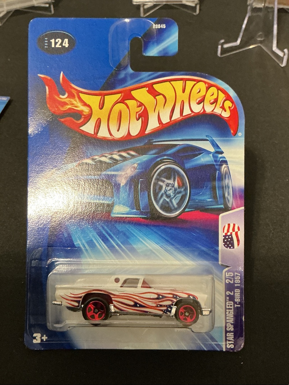 Hot Wheels Star Spangled '57 T-Bird Toy Car - White with Red & Blue Flames